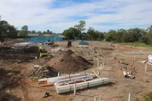 Construction timelapse camera capturing site progress under clear skies